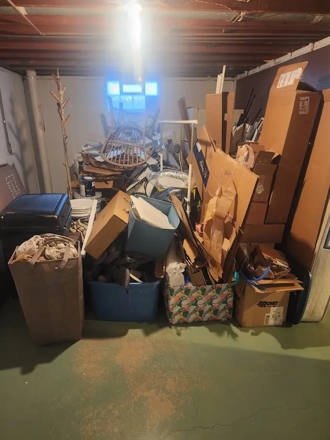 Roll-off dumpster container at job site for Yard Waste Dumpster Rental in South Cleveland